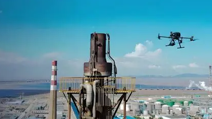 Drone flying near industrial facility